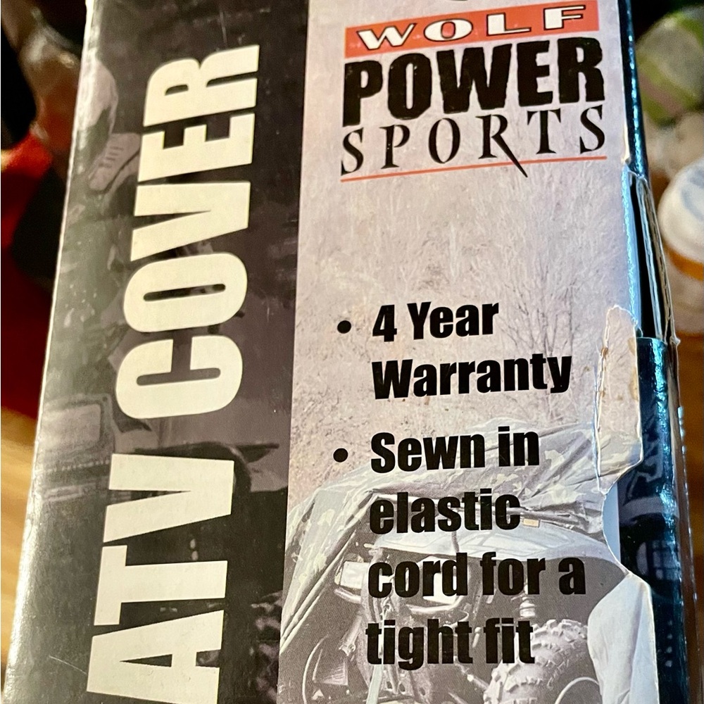 ATV COVER.  Size Large (87” x 49” x 33.5”). Wolf Power Sports. From Menards.